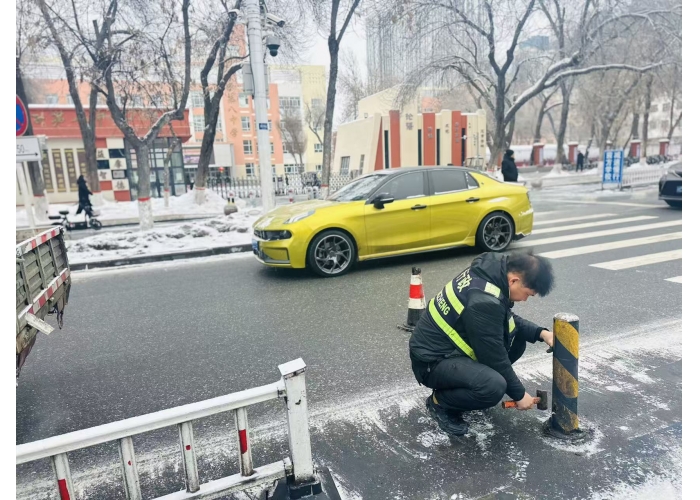当好“护学人”  城管局市政工程养护
